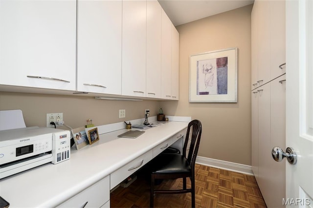 816 S Hanley Rd Unit 8C, Saint Louis, MO 63105 - home office with built in desk and baseboards