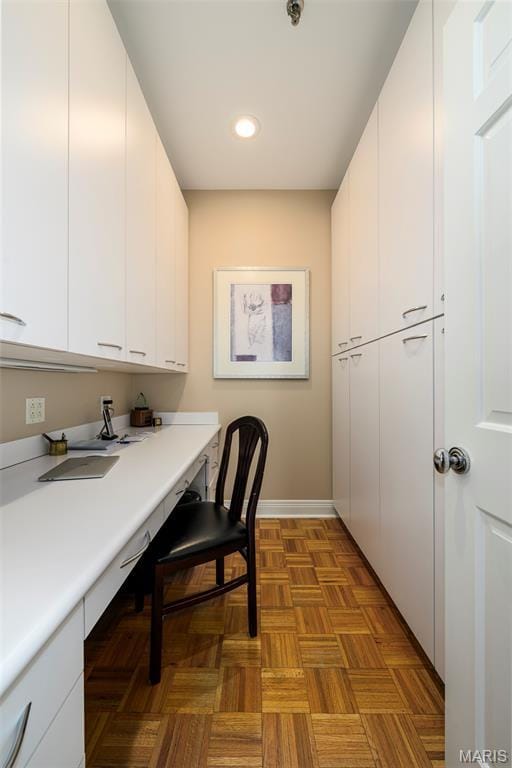 816 S Hanley Rd Unit 8C, Saint Louis, MO 63105 - office area with built in desk and recessed lighting