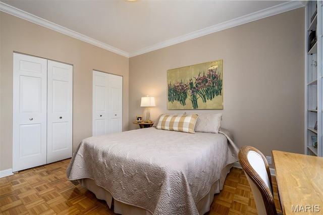 816 S Hanley Rd Unit 8C, Saint Louis, MO 63105 - bedroom with two closets and crown molding