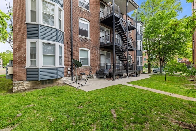 701 Limit Ave, University City, MO 63130 - view of apartment building / complex featuring stairs