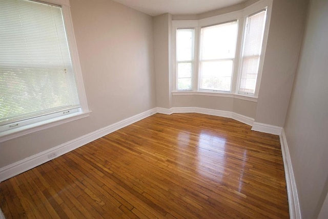 701 Limit Ave, University City, MO 63130 - unfurnished room featuring baseboards and hardwood / wood-style floors