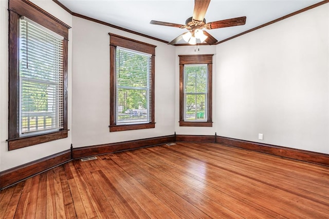 305 W 1st St, Farmington, MO 63640 - unfurnished room featuring ornamental molding, hardwood / wood-style flooring, baseboards, and a ceiling fan