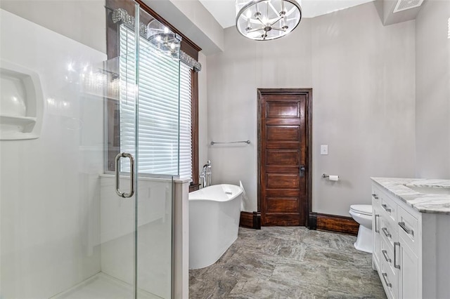 305 W 1st St, Farmington, MO 63640 - full bath featuring vanity, a stall shower, a chandelier, a soaking tub, and toilet