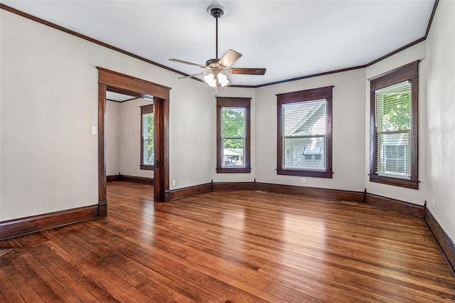 305 W 1st St, Farmington, MO 63640 - unfurnished room featuring hardwood / wood-style floors, ornamental molding, plenty of natural light, and baseboards