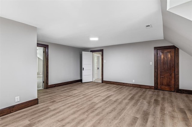 305 W 1st St, Farmington, MO 63640 - empty room with wood finished floors and baseboards