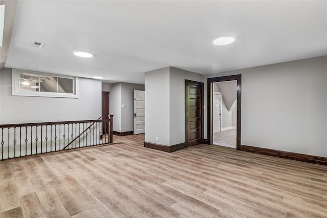 305 W 1st St, Farmington, MO 63640 - spare room featuring light wood-style floors and baseboards