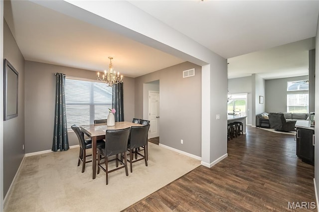 1510 Kennabrooke Ct, Saint Louis, MO 63146 - dining space featuring a chandelier and wood finished floors