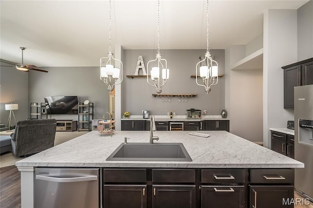 1510 Kennabrooke Ct, Saint Louis, MO 63146 - kitchen with stainless steel appliances, a chandelier, open floor plan, light countertops, and ceiling fan
