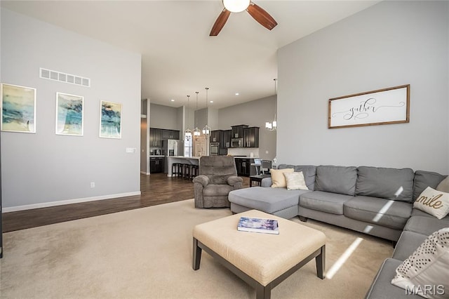1510 Kennabrooke Ct, Saint Louis, MO 63146 - living area featuring a ceiling fan, carpet flooring, wood finished floors, recessed lighting, and a chandelier
