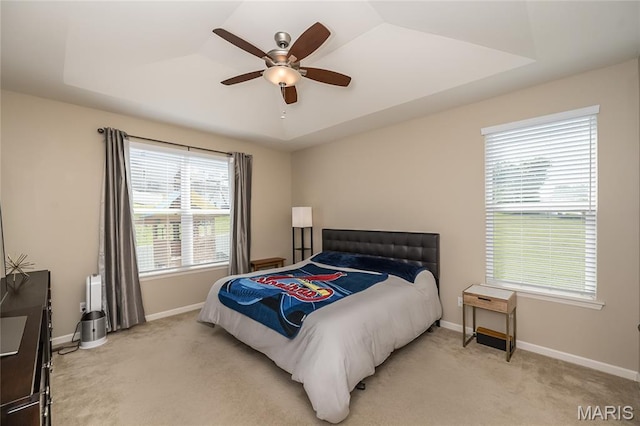 1510 Kennabrooke Ct, Saint Louis, MO 63146 - bedroom featuring light carpet, a tray ceiling, and ceiling fan