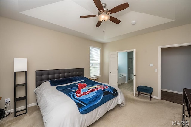 1510 Kennabrooke Ct, Saint Louis, MO 63146 - bedroom with light colored carpet, a raised ceiling, and a ceiling fan