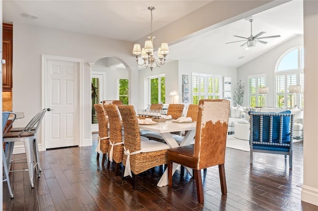 5360 Tower Hill Ct, Weldon Spring, MO 63304 - dining area with arched walkways, dark wood finished floors, lofted ceiling, a ceiling fan, and a chandelier