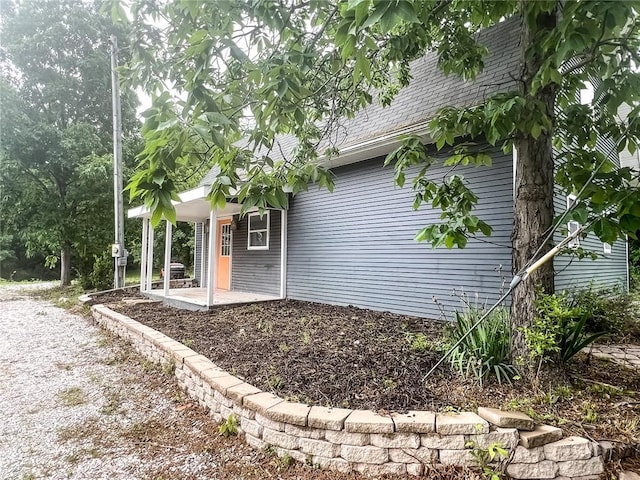 408 E Monroe St, Paris, MO 65275 - view of home's exterior with covered porch