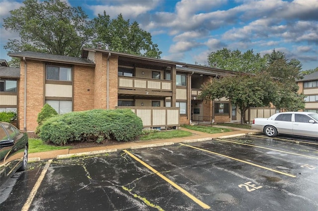 2 Fairways Cir Unit G, Saint Charles, MO 63303 - view of building exterior featuring uncovered parking