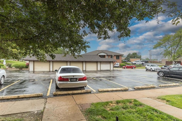 2 Fairways Cir Unit G, Saint Charles, MO 63303 - view of front of home with community garages and uncovered parking
