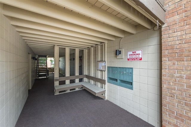2 Fairways Cir Unit G, Saint Charles, MO 63303 - doorway to property featuring brick siding