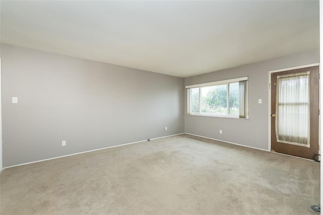 2 Fairways Cir Unit G, Saint Charles, MO 63303 - unfurnished room with light carpet and baseboards