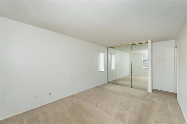 2 Fairways Cir Unit G, Saint Charles, MO 63303 - unfurnished bedroom with carpet flooring and a closet