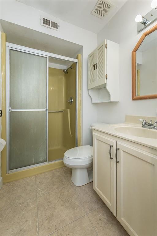 2 Fairways Cir Unit G, Saint Charles, MO 63303 - bathroom featuring vanity, toilet, and a stall shower