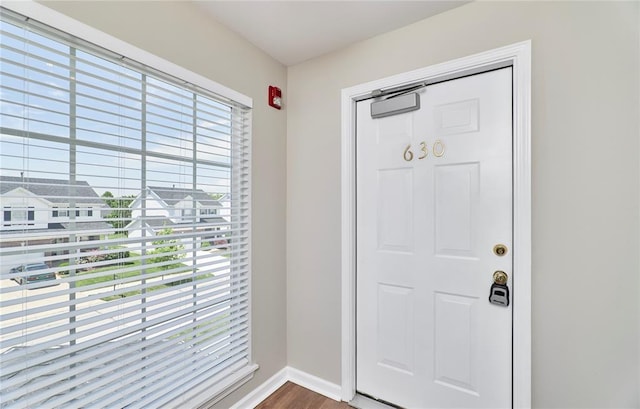 630 Homerun Dr Unit 12N, Ofallon, MO 63366 - entrance foyer with baseboards and wood finished floors