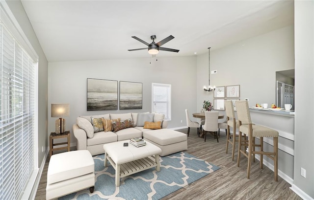630 Homerun Dr Unit 12N, Ofallon, MO 63366 - living area featuring lofted ceiling, wood finished floors, a ceiling fan, plenty of natural light, and baseboards