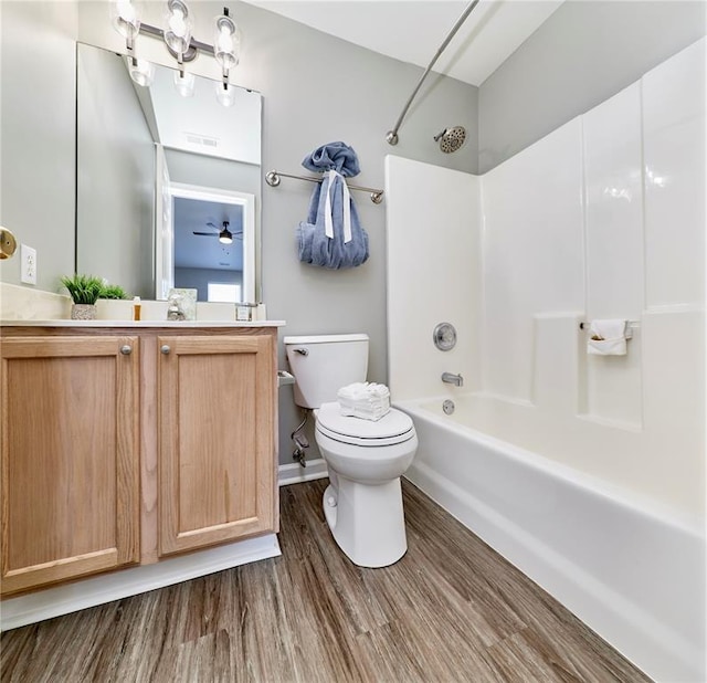630 Homerun Dr Unit 12N, Ofallon, MO 63366 - bathroom with toilet, tub / shower combination, vanity, and wood finished floors
