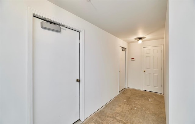 630 Homerun Dr Unit 12N, Ofallon, MO 63366 - corridor with concrete floors
