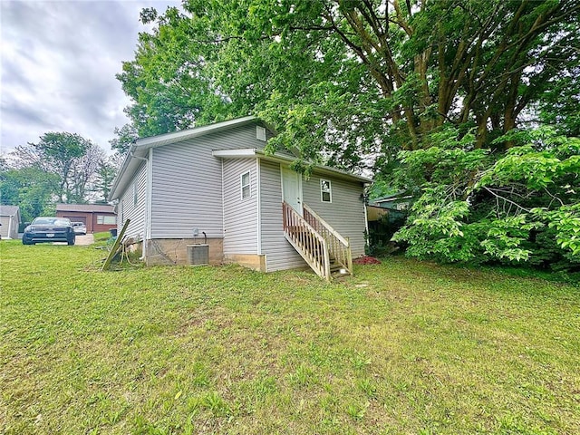 155 W Bonfils St, Troy, MO 63379 - rear view of property with a yard and entry steps