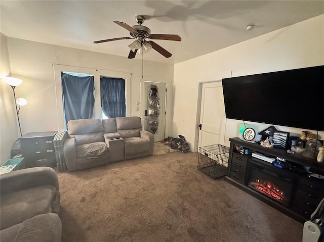 155 W Bonfils St, Troy, MO 63379 - living area with carpet flooring, a ceiling fan, and a glass covered fireplace