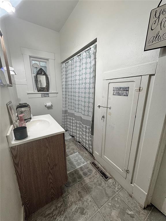 155 W Bonfils St, Troy, MO 63379 - bathroom featuring vanity and a shower with curtain