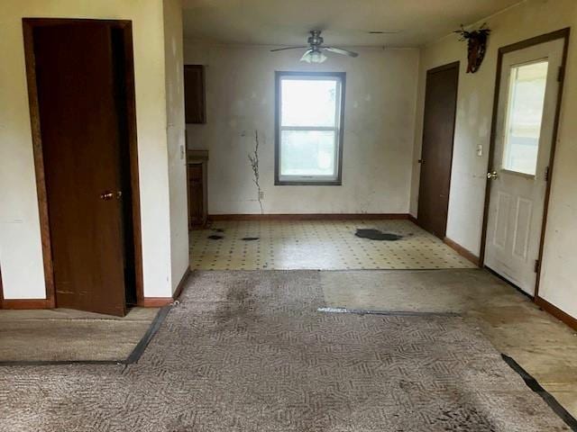 506 W Main St, Matthews, MO 63867 - carpeted entrance foyer featuring baseboards and ceiling fan