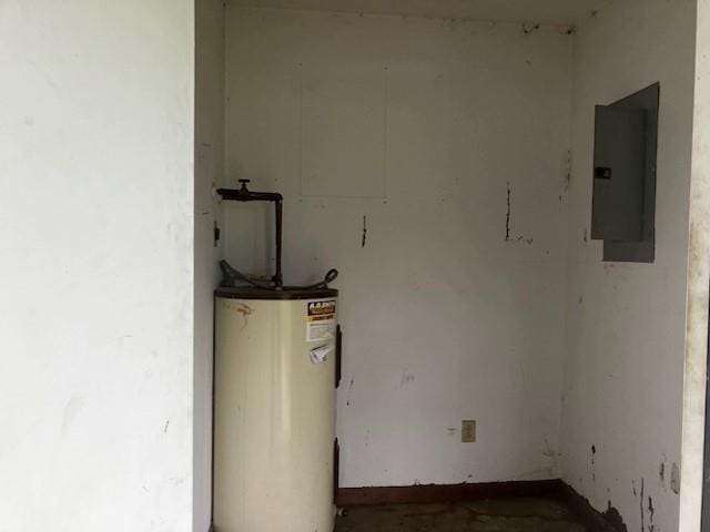 506 W Main St, Matthews, MO 63867 - utility room with water heater and electric panel