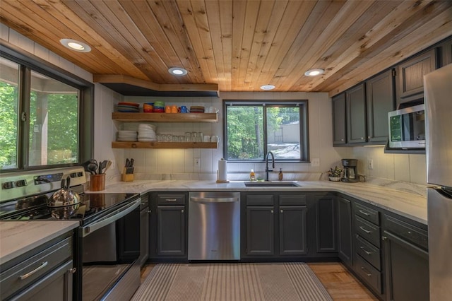 2349 Trautwein Dr, Innsbrook, MO 63390 - kitchen with stainless steel appliances, a sink, wood ceiling, light stone countertops, and recessed lighting