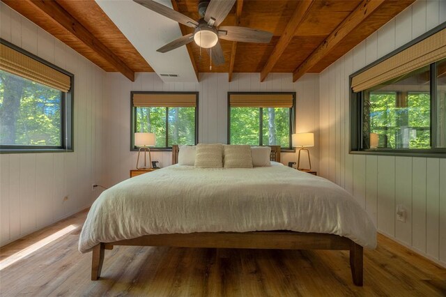 2349 Trautwein Dr, Innsbrook, MO 63390 - bedroom featuring multiple windows, wood finished floors, wood ceiling with exposed beams, and a ceiling fan