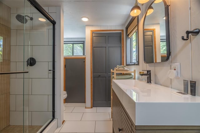 2349 Trautwein Dr, Innsbrook, MO 63390 - bathroom featuring a shower stall, toilet, vanity, and tile patterned flooring