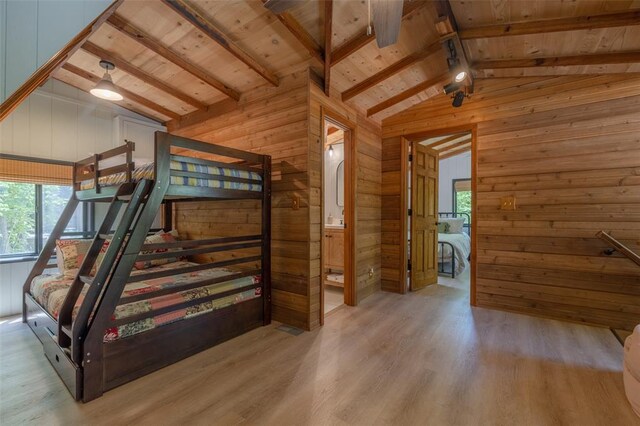 2349 Trautwein Dr, Innsbrook, MO 63390 - unfurnished bedroom with wood finished floors, wood walls, and wooden ceiling