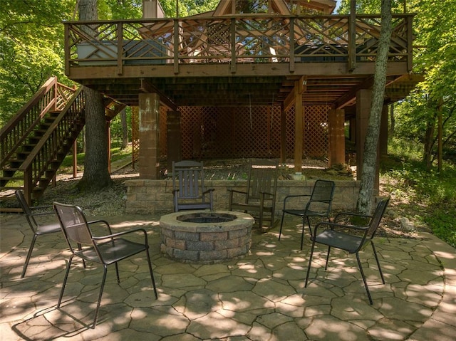 2349 Trautwein Dr, Innsbrook, MO 63390 - view of patio featuring stairway, a wooden deck, and a fire pit