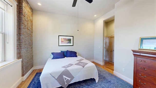 1107 N 2nd St, Saint Charles, MO 63301 - bedroom with light wood-type flooring, radiator, baseboards, and recessed lighting