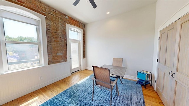 1107 N 2nd St, Saint Charles, MO 63301 - office space featuring a ceiling fan, light wood-type flooring, brick wall, and baseboards