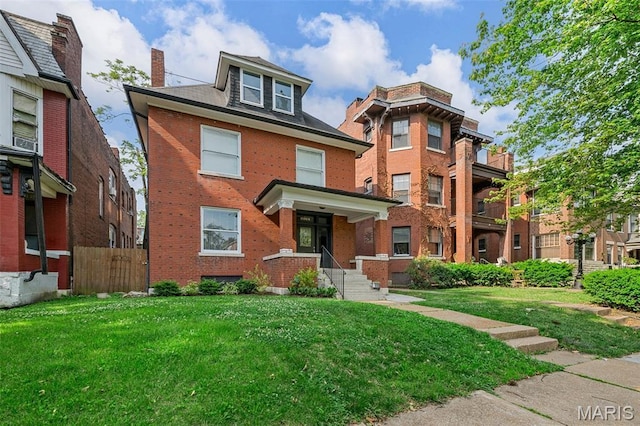 6014 Westminster Pl, Saint Louis, MO 63112 - view of front facade with brick siding and a chimney