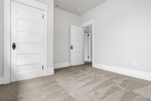 6014 Westminster Pl, Saint Louis, MO 63112 - unfurnished bedroom with carpet flooring and baseboards
