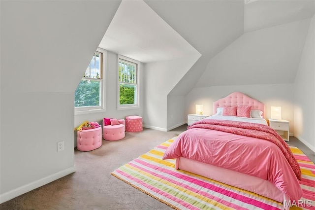 6014 Westminster Pl, Saint Louis, MO 63112 - carpeted bedroom with baseboards and vaulted ceiling