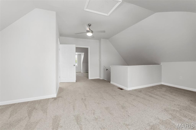 6014 Westminster Pl, Saint Louis, MO 63112 - bonus room featuring lofted ceiling, carpet floors, attic access, baseboards, and ceiling fan