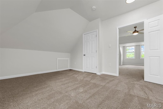 6014 Westminster Pl, Saint Louis, MO 63112 - additional living space with vaulted ceiling, carpet, baseboards, and ceiling fan