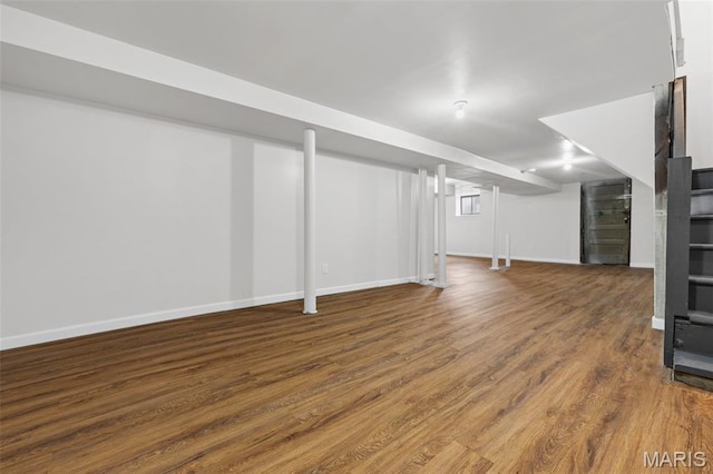 6014 Westminster Pl, Saint Louis, MO 63112 - finished basement featuring wood finished floors and baseboards
