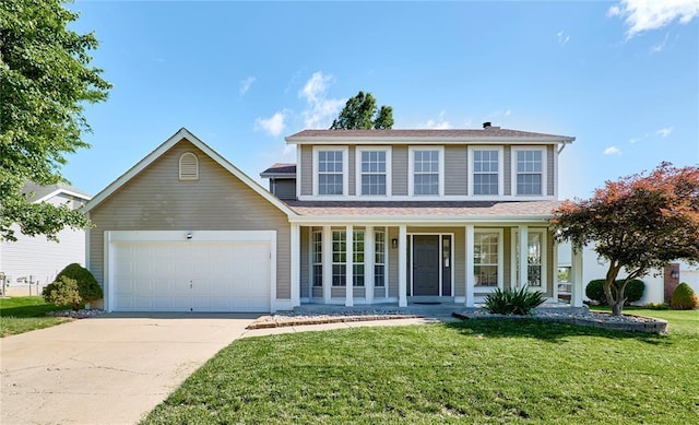 7219 Watsons Parish Dr, Ofallon, MO 63368 - view of front of property with an attached garage, a porch, driveway, and a front lawn