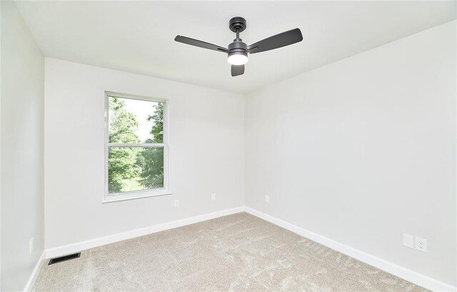 7219 Watsons Parish Dr, Ofallon, MO 63368 - empty room featuring baseboards, ceiling fan, and carpet flooring