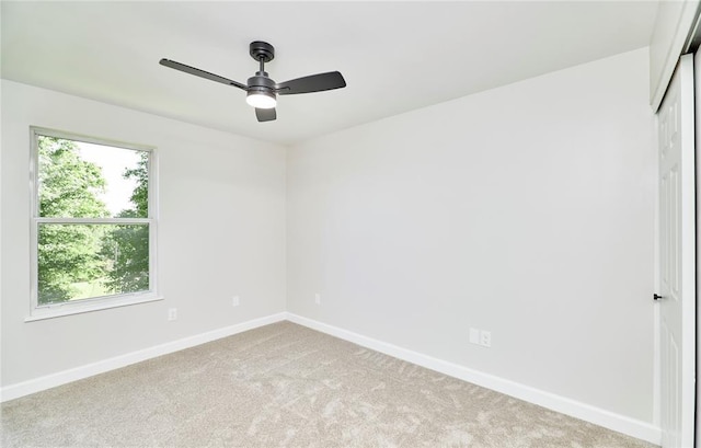 7219 Watsons Parish Dr, Ofallon, MO 63368 - unfurnished room with ceiling fan, baseboards, and light carpet