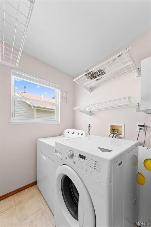 3060 Almond Tree Dr, Saint Peters, MO 63376 - washroom with independent washer and dryer and light tile patterned flooring