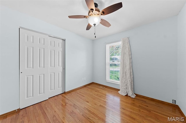 3060 Almond Tree Dr, Saint Peters, MO 63376 - unfurnished bedroom featuring light wood-type flooring, a closet, and ceiling fan
